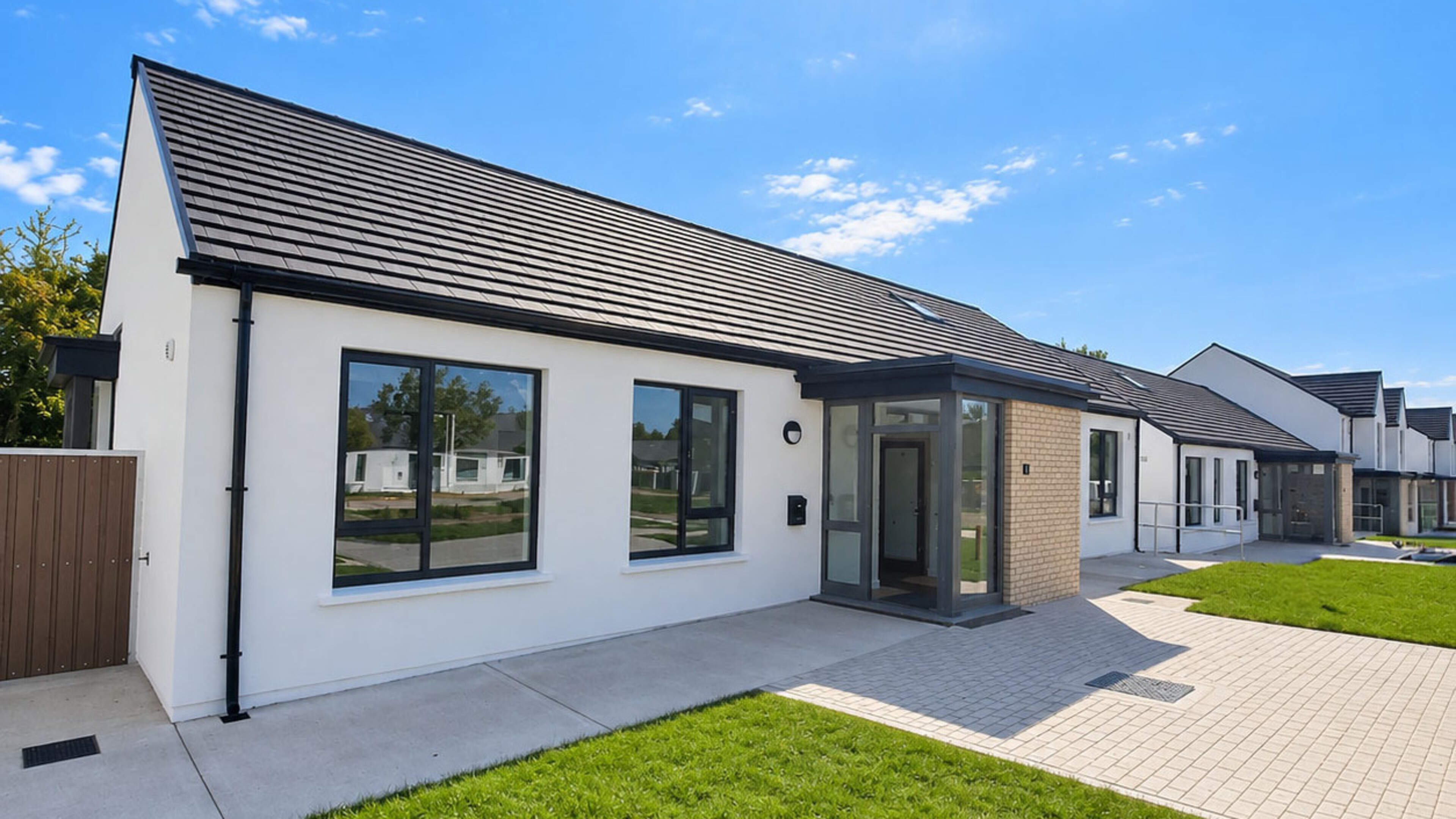 ‘Delight’ as 17 Limerick families get keys to new homes and chance to ‘put down roots’